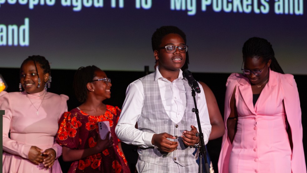 A young person gives an inspiring acceptance speech.